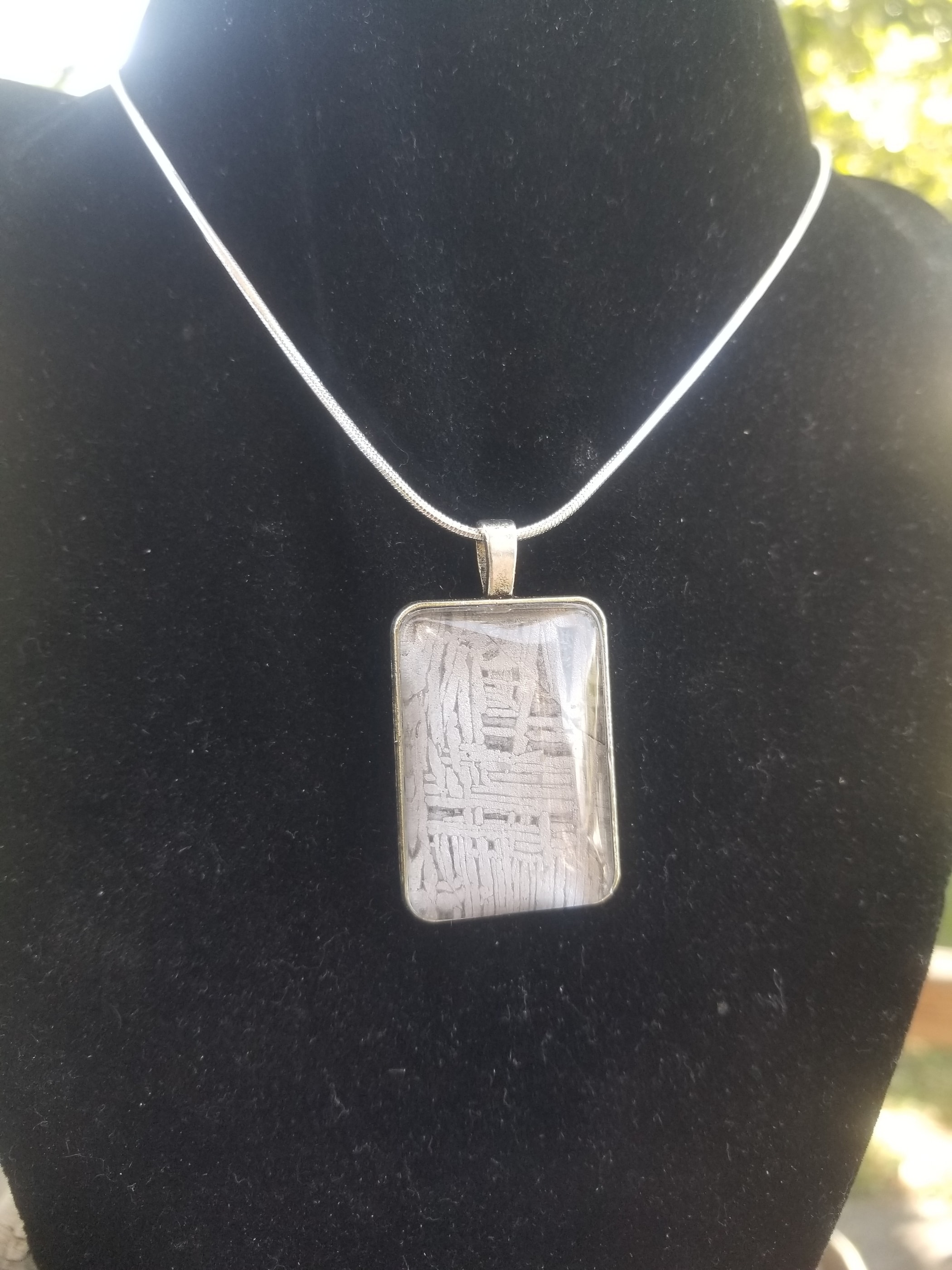 Unique Aletai Meteorite Sphere Presented in Sterling Silver Angel Wings Pendant - Widmanstätten Pattern